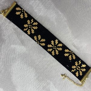 دستبند میوکی مشکی طلایی
